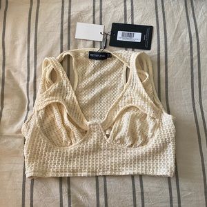 Cream crop top.